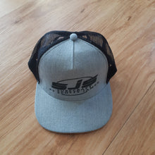 Load image into Gallery viewer, Top quality retro style SJS logo on soft grey truckers cap photo from the top looking down. Black mesh back for less heat
